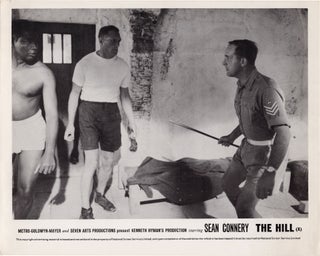 Book #132215] The Hill (Collection of 8 British front-of-house cards from the 1965 film). Sidney...