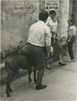 Book #135630] Antonella Lualdi and her donkey (Vintage press photograph). Antonella, Lualdi Carlo...