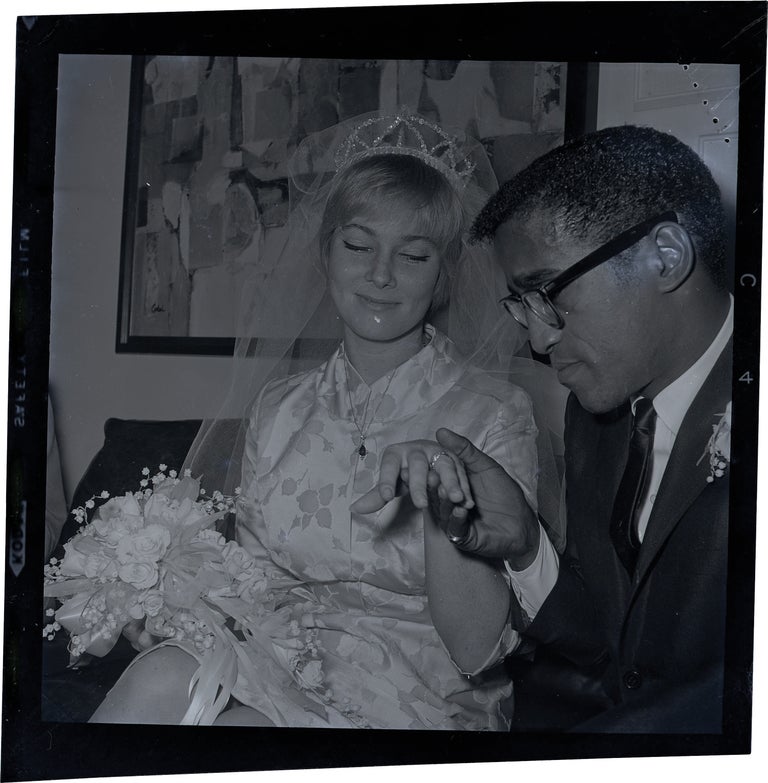 [Book #138925] Original negative of Sammy Davis, Jr. and Mary Britt at their wedding. Sammy Davis, Mary Britt, Jr., subjects.