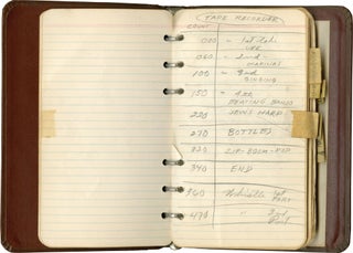 Notebook containing film strips, technical notes and tests results for film and camera settings, including "Multiple SIDosis"