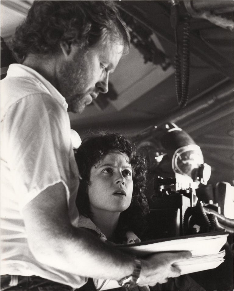 Book #143640] Alien (Original photograph of Ridley Scott and Sigourney Weaver from the set of the...
