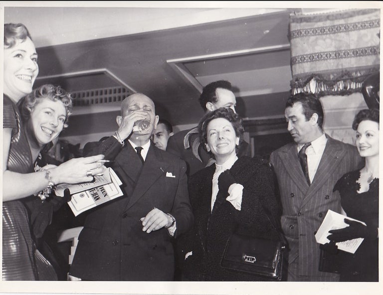 Two photographs of director Erich von Stroheim at a party for the release of "Les feu de la Saint-Jean," June 25, 1954
