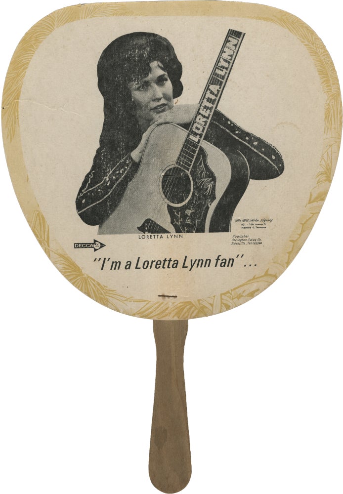 [Book #147137] Original promotional "I'm a Loretta Lynn fan" paddle hand fan. Loretta Lynn, subject.