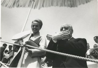 Book #147455] Original photograph of Alfred Hitchcock and Tippi Hedren at Cannes, 1963. Alfred...