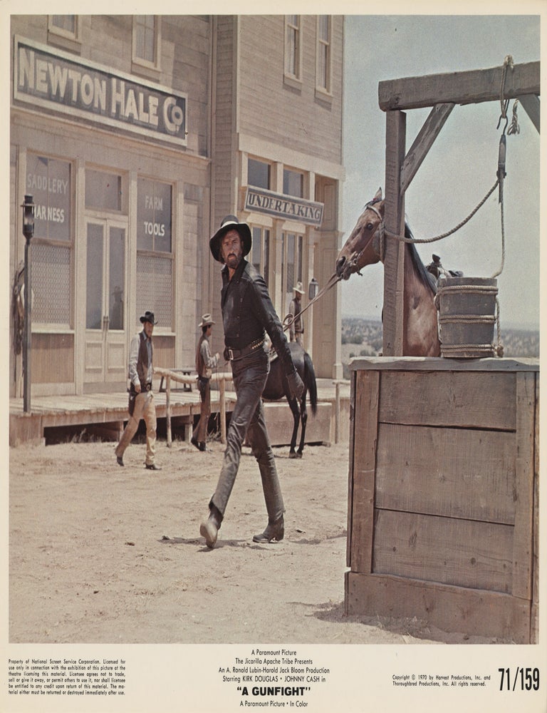 Book #147747] A Gunfight (Collection of 13 original photographs from the 1971 film). Jane...