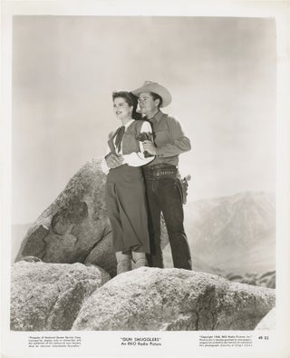 Book #147823] Gun Smugglers (Two original photographs from the 1948 film). Frank McDonald, Norman...