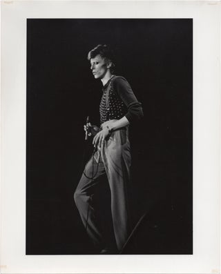 Book #147939] Collection of sixteen original photographs of David Bowie, 1974. David Bowie, Duana...
