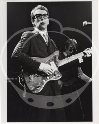 Book #147940] Collection of eight original photographs of Elvis Costello and the Attractions in...