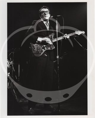 Collection of eight original photographs of Elvis Costello and the Attractions in concert, circa 1970s