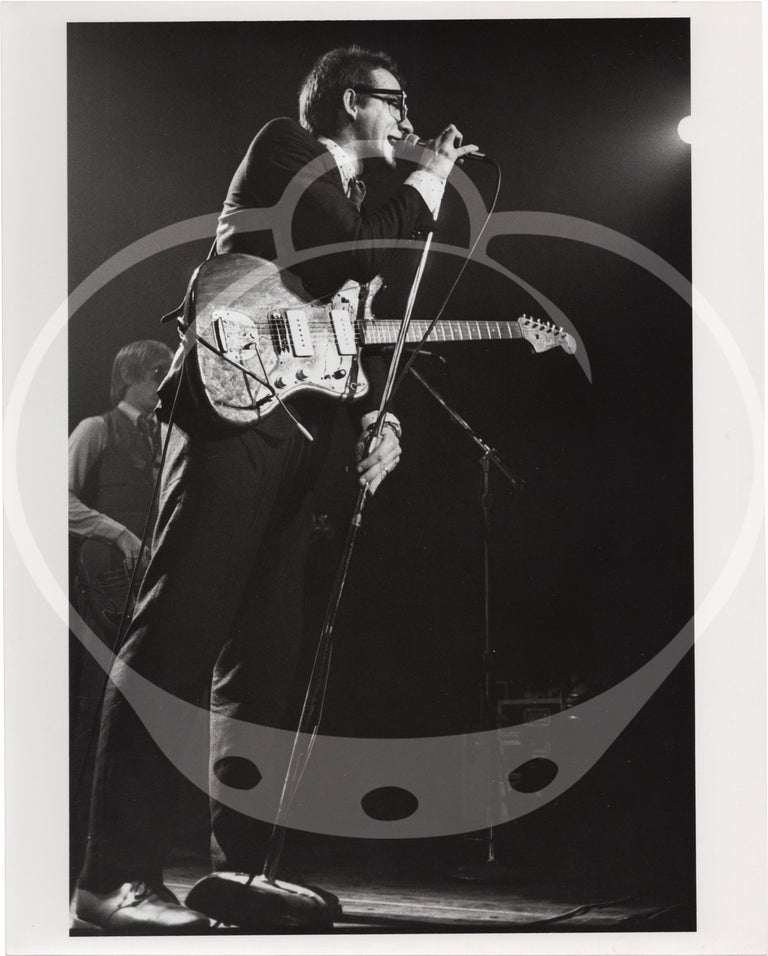Eight original photographs of Elvis Costello and the Attractions in concert, circa 1970s