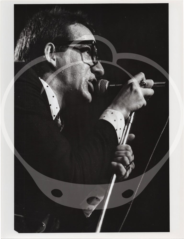 Eight original photographs of Elvis Costello and the Attractions in concert, circa 1970s