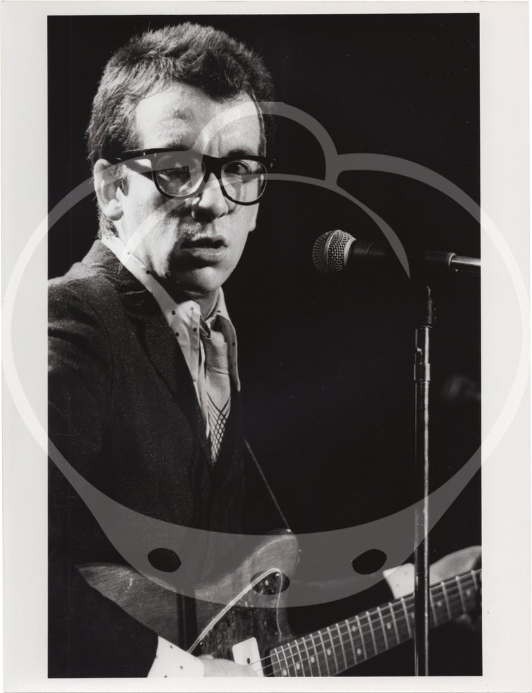 Eight original photographs of Elvis Costello and the Attractions in concert, circa 1970s