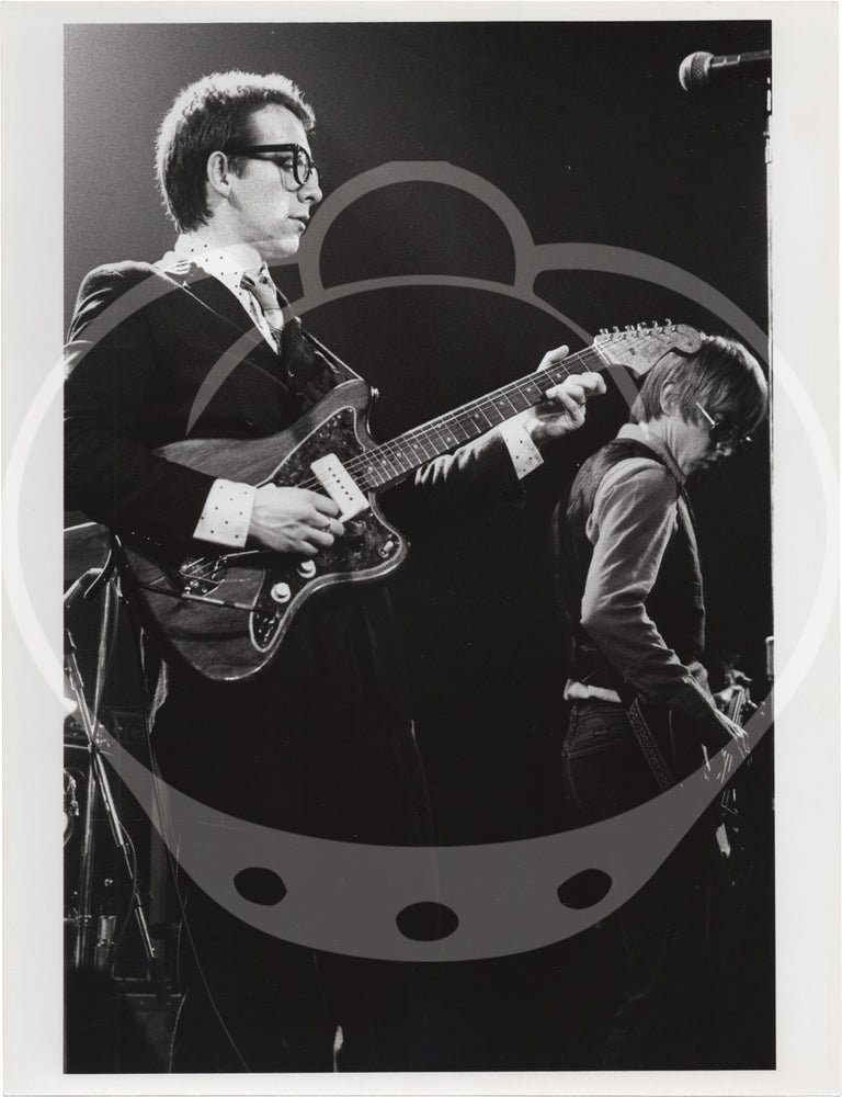 Eight original photographs of Elvis Costello and the Attractions in concert, circa 1970s