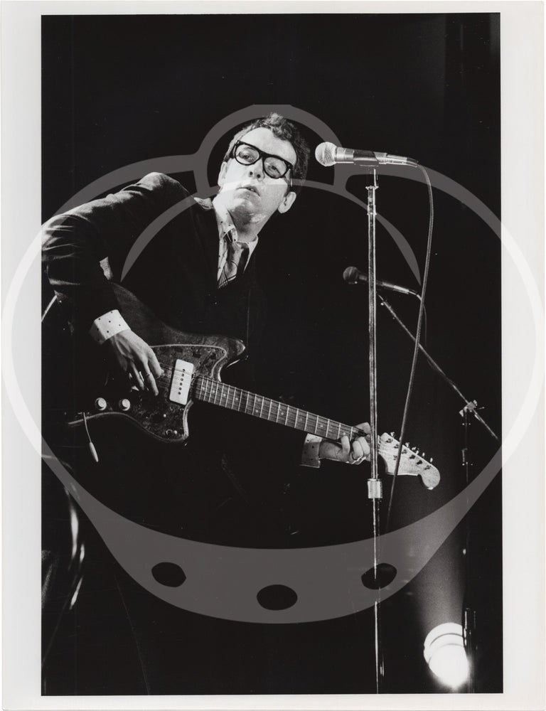 Eight original photographs of Elvis Costello and the Attractions in concert, circa 1970s