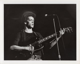 Book #147954] Archive of six original photographs of Lou Reed, circa 1975. Lou Reed, Duana LeMay,...
