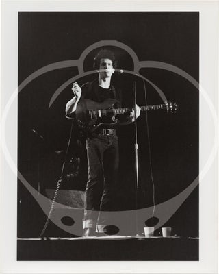 Archive of six original photographs of Lou Reed, circa 1975