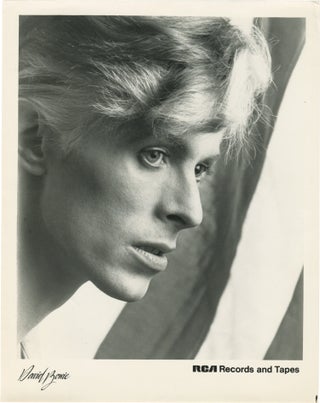 Book #148809] Two original photographs of David Bowie promoting his appearance in the 1976 film...