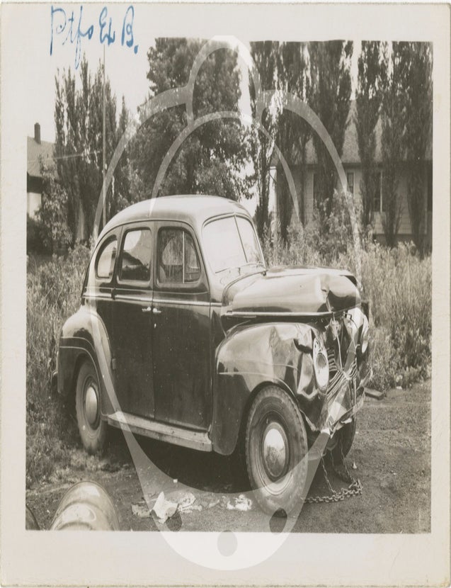 Archive of 59 original photographs of automobile accidents in the Minneapolis-St. Paul area, circa 1930s-1940s