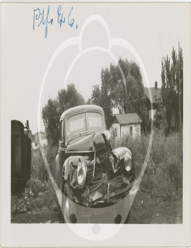 Archive of 59 original photographs of automobile accidents in the Minneapolis-St. Paul area, circa 1930s-1940s