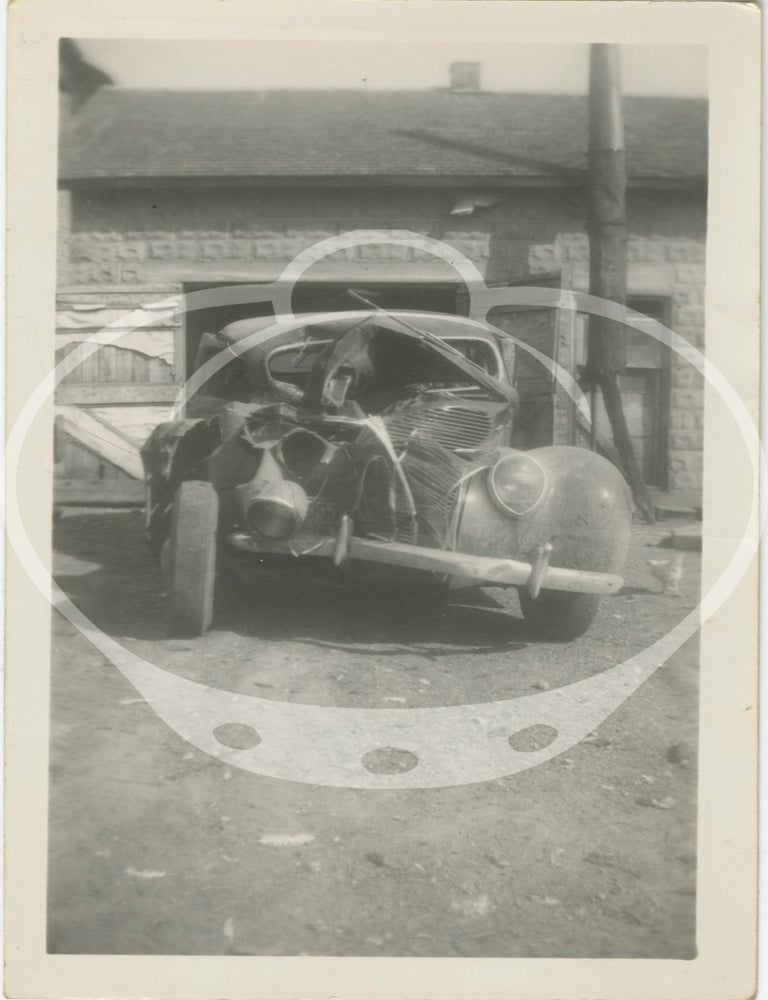 Archive of 59 original photographs of automobile accidents in the Minneapolis-St. Paul area, circa 1930s-1940s