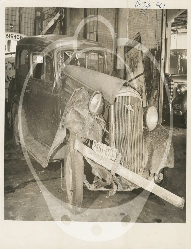 Archive of 59 original photographs of automobile accidents in the Minneapolis-St. Paul area, circa 1930s-1940s