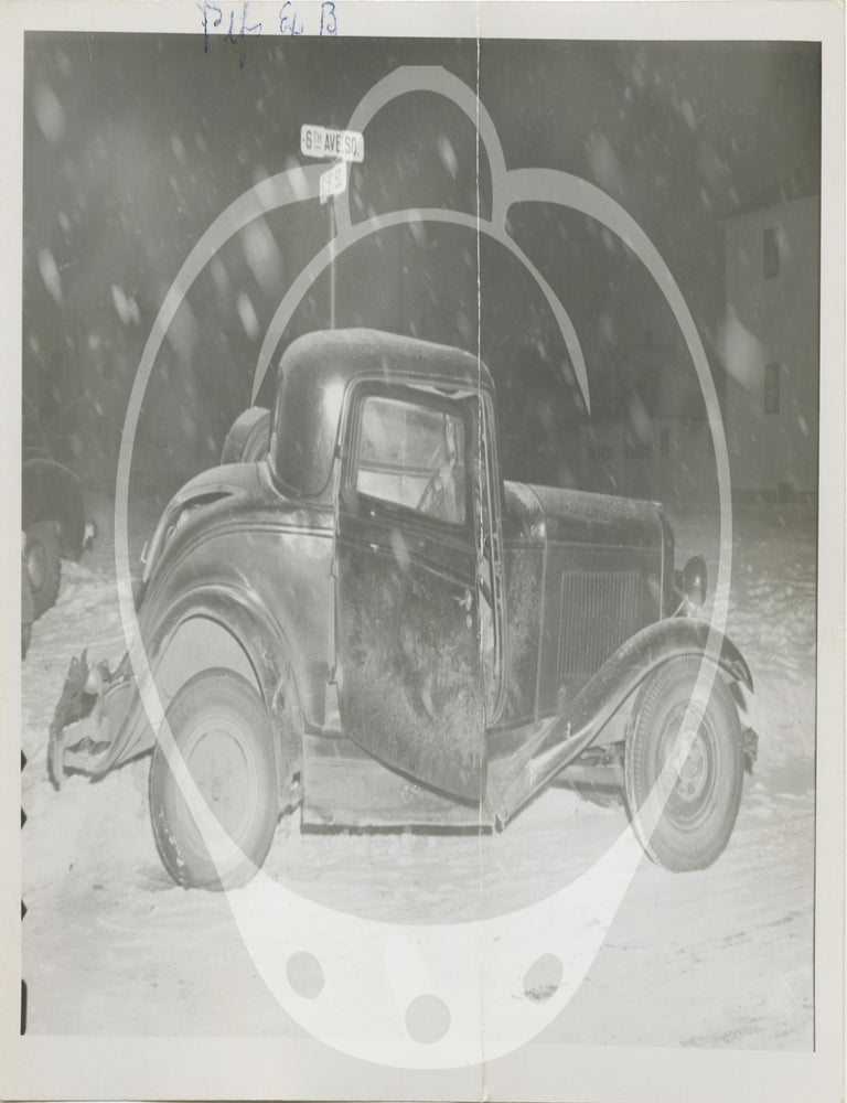 Archive of 59 original photographs of automobile accidents in the Minneapolis-St. Paul area, circa 1930s-1940s