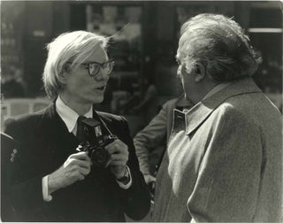 Book #149369] Original photograph of Andy Warhol and Federico Fellini, 1977. Andy, Warhol...