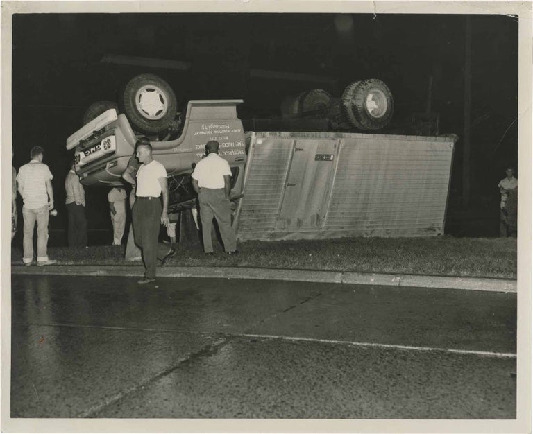 [Book #149422] Archive of 48 original photographs of car accident scenes, 1961-1968. Automobile accidents.