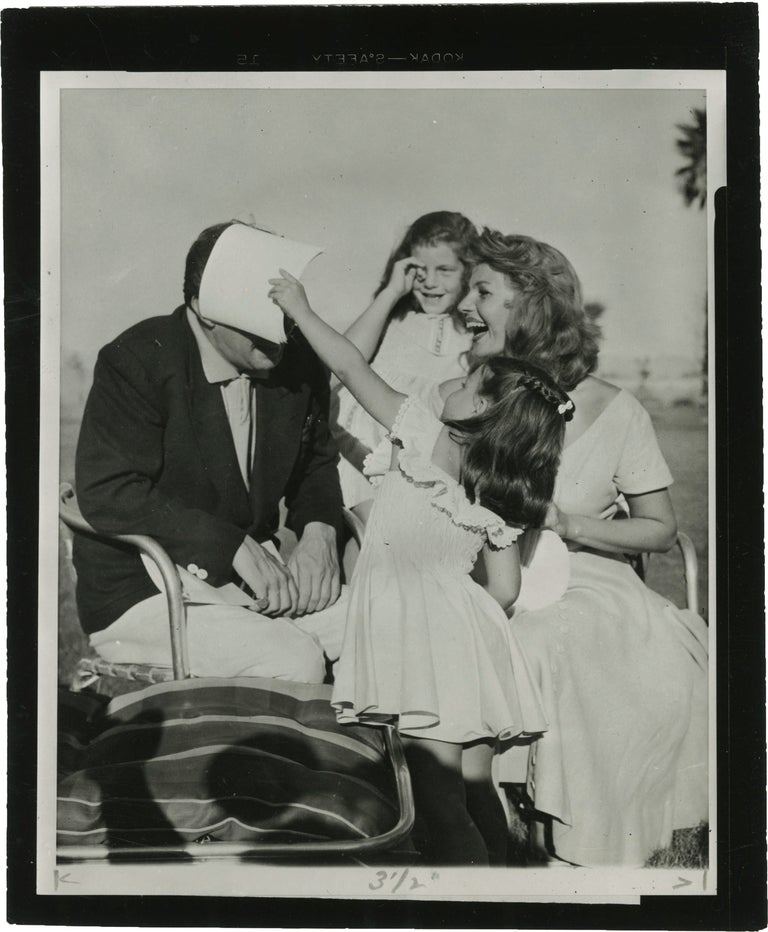 [Book #149423] Original photograph of Rita Hayworth and her family, circa 1950s. Rita, Hayworth Dick Haymes, subjects.