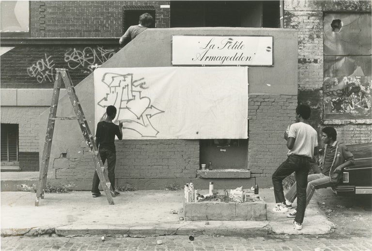 Book #149925] Two original photographs of graffiti artist A-One in New York, 1982. Anthony Clark,...