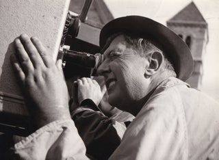 Book #150072] Original photograph of Jacques Tati, circa 1958, to announce commencement of...