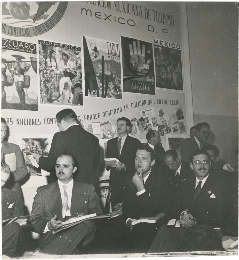 [Book #150218] Original photograph of Orson Welles attending the Inter-American Conference on Problems of War and Peace, circa 1940s. Orson Welles, Victor De Palma, subject, photographer.