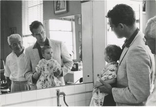 Book #150316] Original photograph of Charlton Heston and his son Fraser at a barbershop, circa...