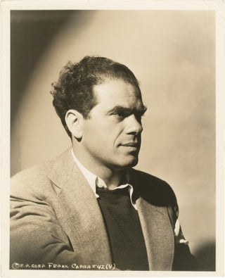 Book #150710] Lost Horizon (Original press portrait photograph of Frank Capra promoting the 1937...