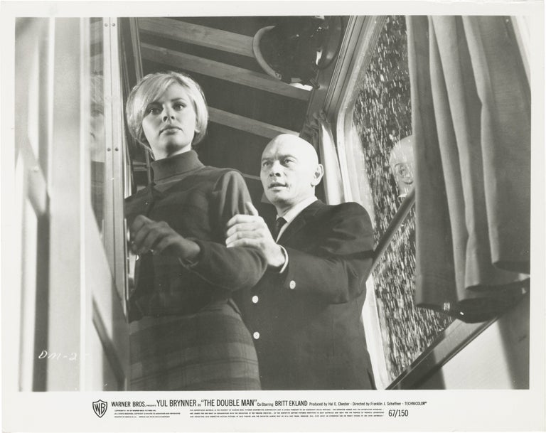Book #150768] The Double Man (Collection of eight original photographs from the 1967 film)....