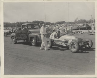 Archive of 14 vernacular photographs of open wheel races at the Iowa State Fair, circa 1950s