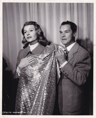 Book #151275] Original photograph of Rita Hayworth and Jean Louis, circa 1954. Rita, Hayworth...