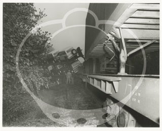 Archive of 32 photographs and a reward poster for a train accident in Raytown, Missouri, 1970