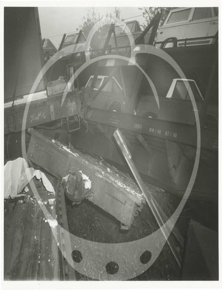 Archive of 32 photographs and a reward poster for a train accident in Raytown, Missouri, 1970