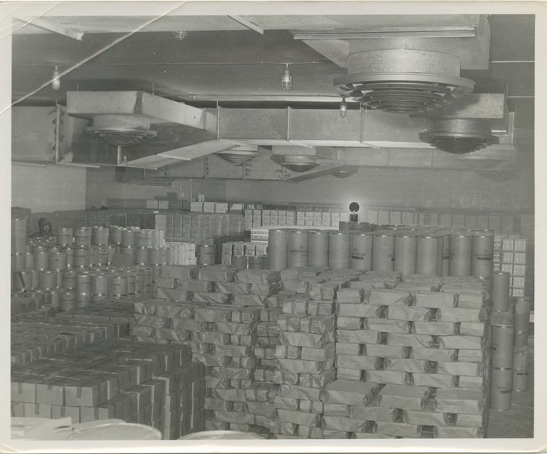 Collection of nine original photographs of industrial dairy freezers, circa 1950s