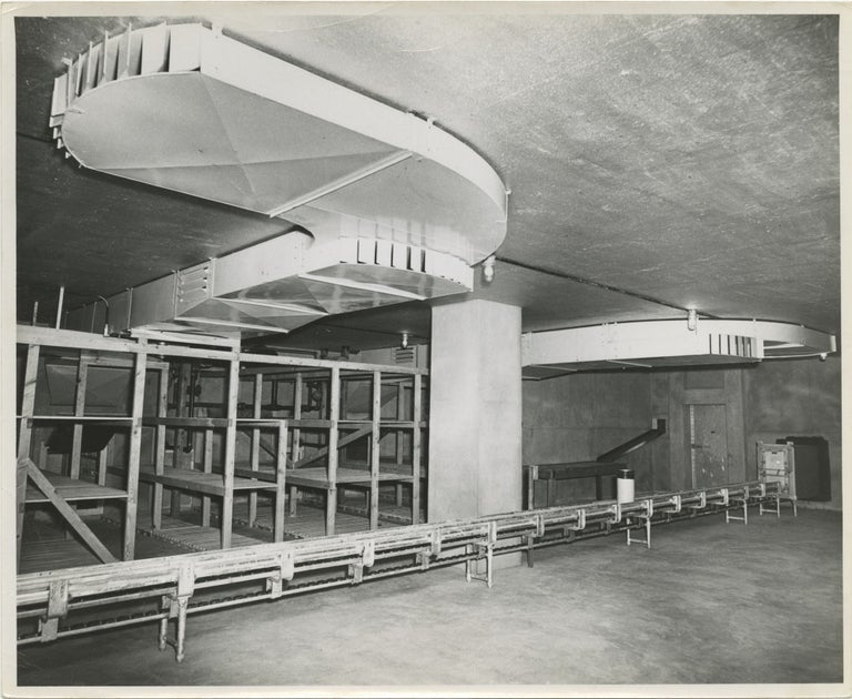 Collection of nine original photographs of industrial dairy freezers, circa 1950s
