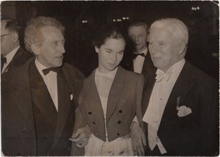 Book #151745] Original photograph of Jean Cocteau, Geraldine Chaplin, and Charlie Chaplin at a...