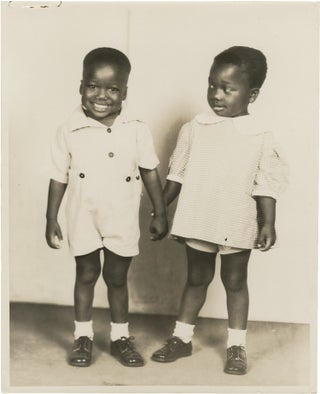 Book #152255] Archive of photographs and letters regarding a pair of African American twin child...