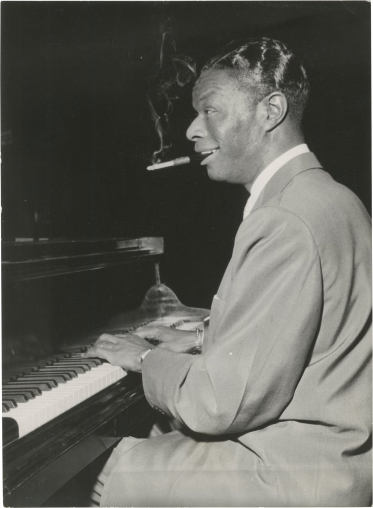 [Book #152462] Original photograph of Nat King Cole at the piano, 1956. Nat King Cole, subject.