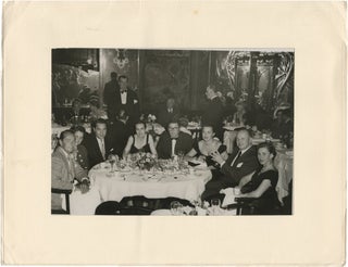 Book #152476] Original photograph of Alan Ladd and friends at Maxim's, 1952. Alan Ladd, subject