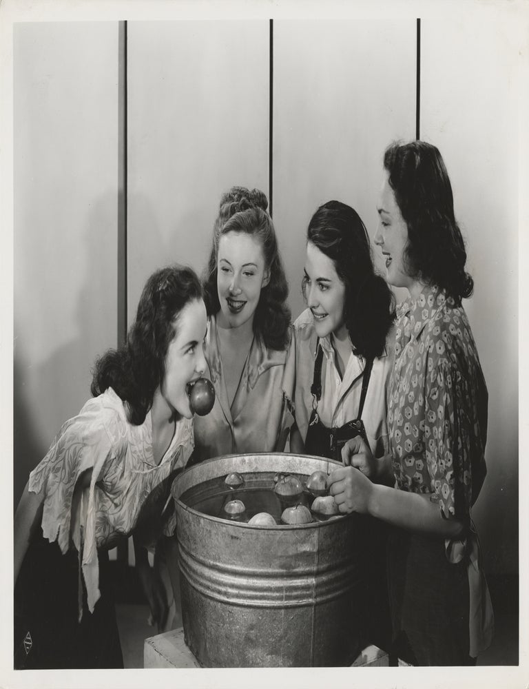 Original photograph of Peggy Diggins, Joan Leslie, Ann Edmonds, and Lucia Carroll bobbing for...