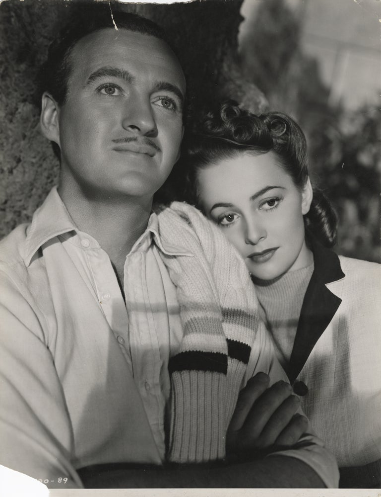Book #152799] Raffles (Original oversize photograph of David Niven and Olivia de Havilland from...