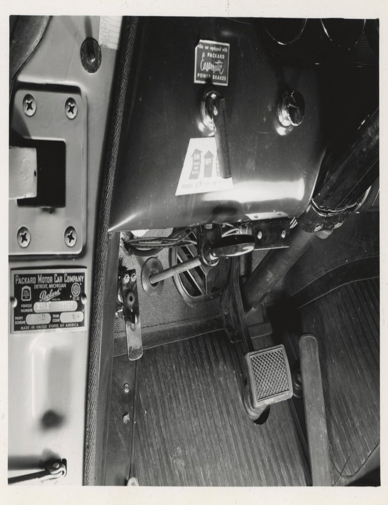 Collection of 13 original photographs of a Packard 200, documenting the car's performance during a road trip to California