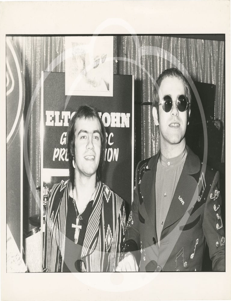 Collection of thirteen original photographs of Elton John, circa 1970s