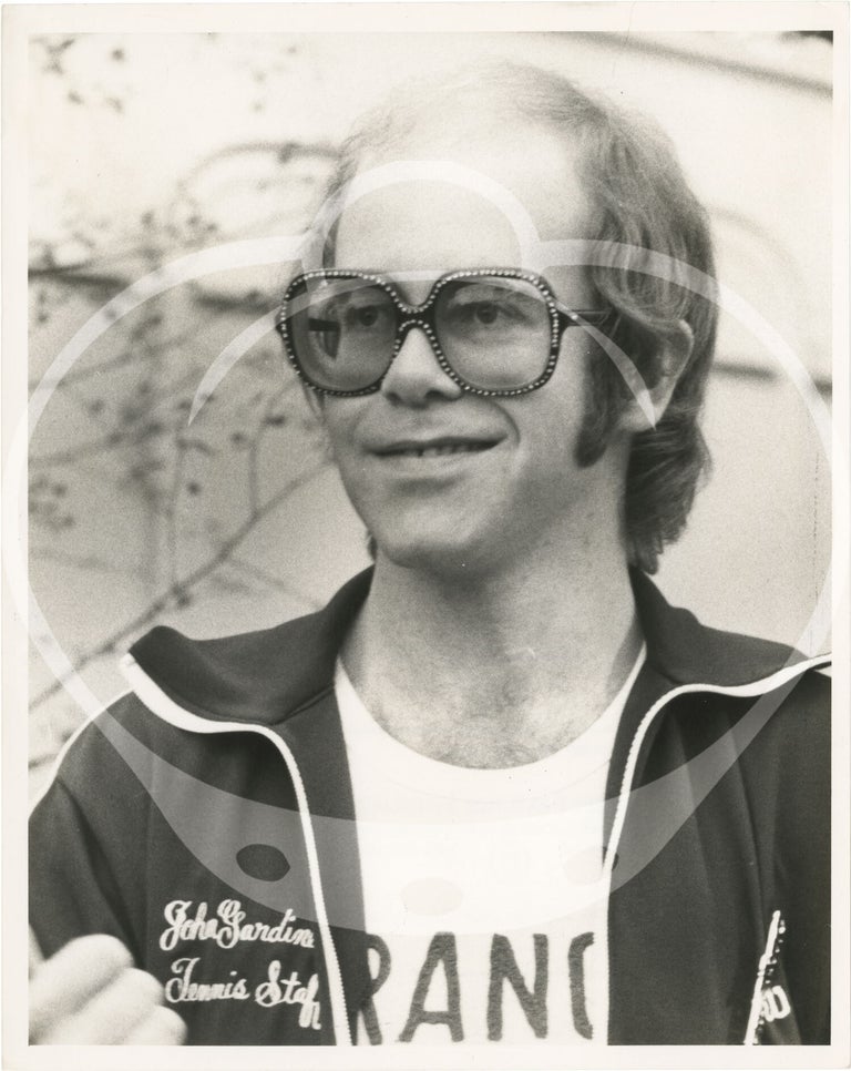 Collection of thirteen original photographs of Elton John, circa 1970s